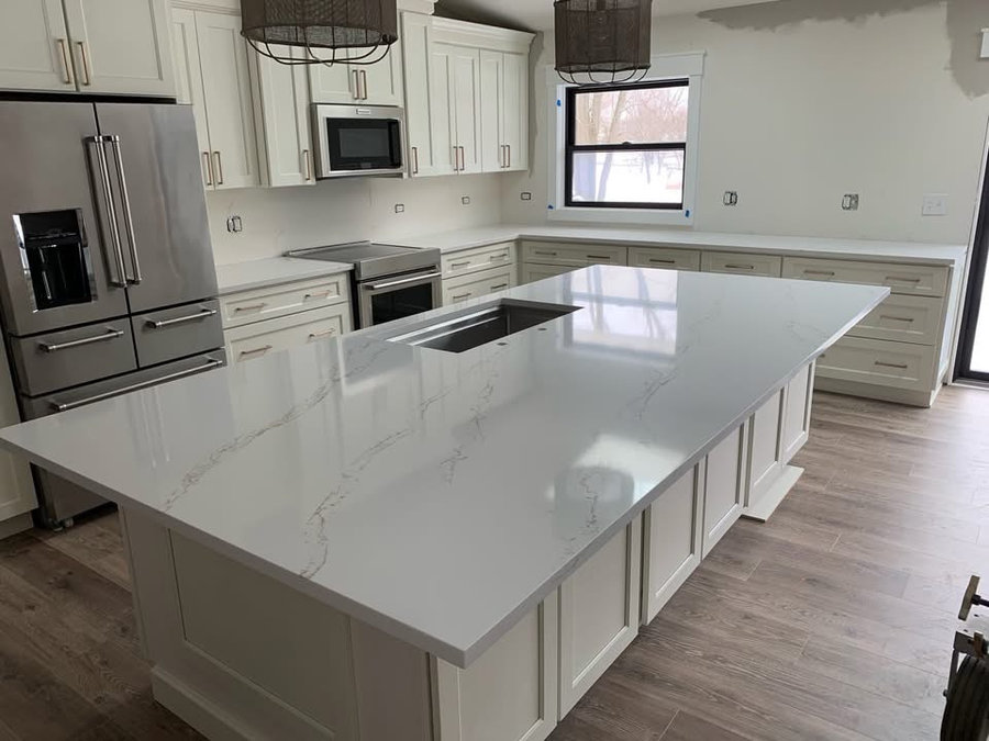 Open-concept kitchen remodel with waterfall island